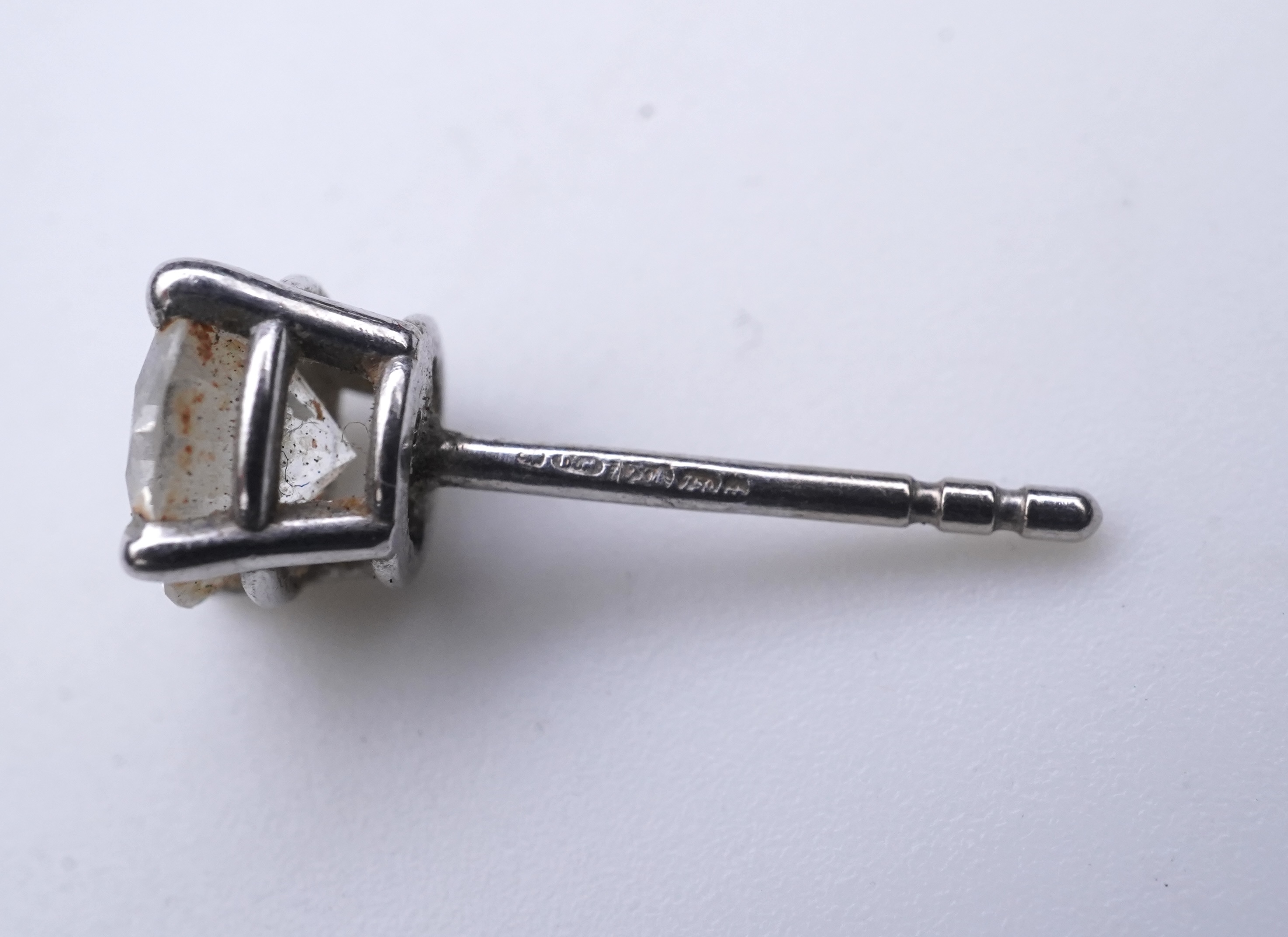 A diamond stud earring